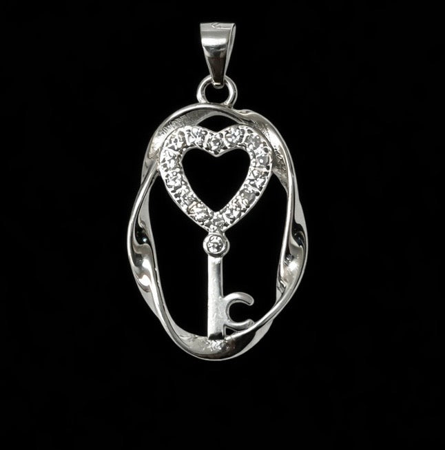 Heart and key pendant