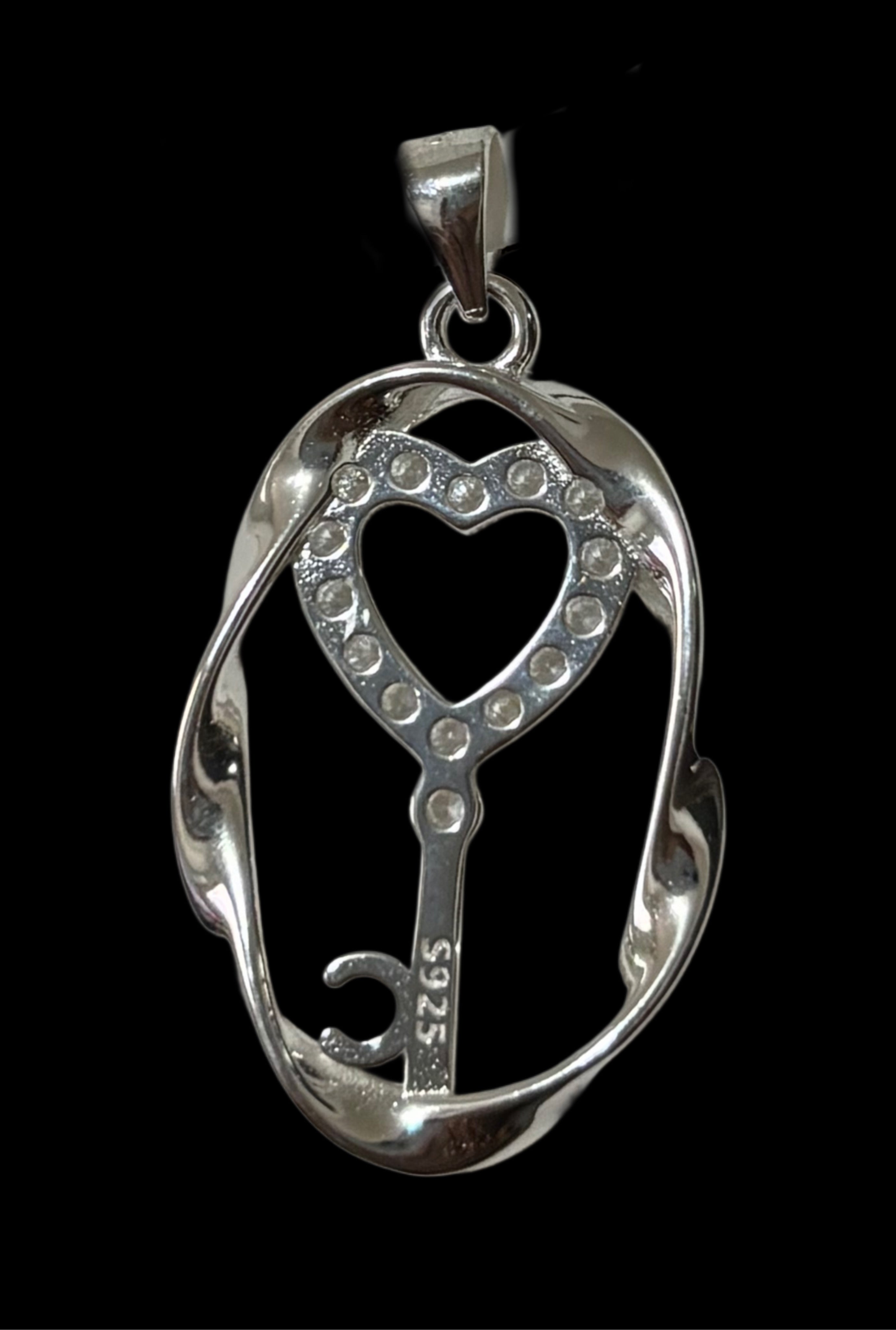 Heart and key pendant